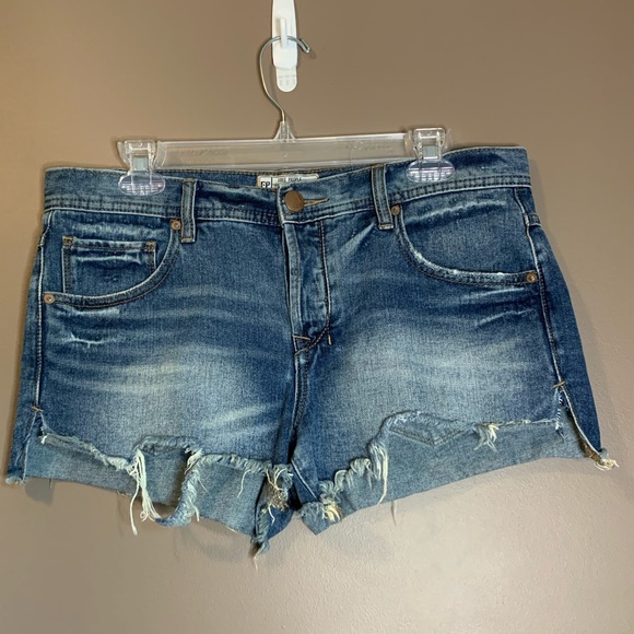 Free people distressed jean shorts. Size 29.